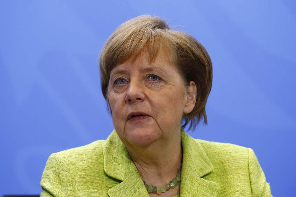 German Chancellor Angela Merkel attends a press conference following a meeting with global economic leaders in the chancellery in Berlin on April 10, 2017. AFP / MICHELE TANTUSSI
