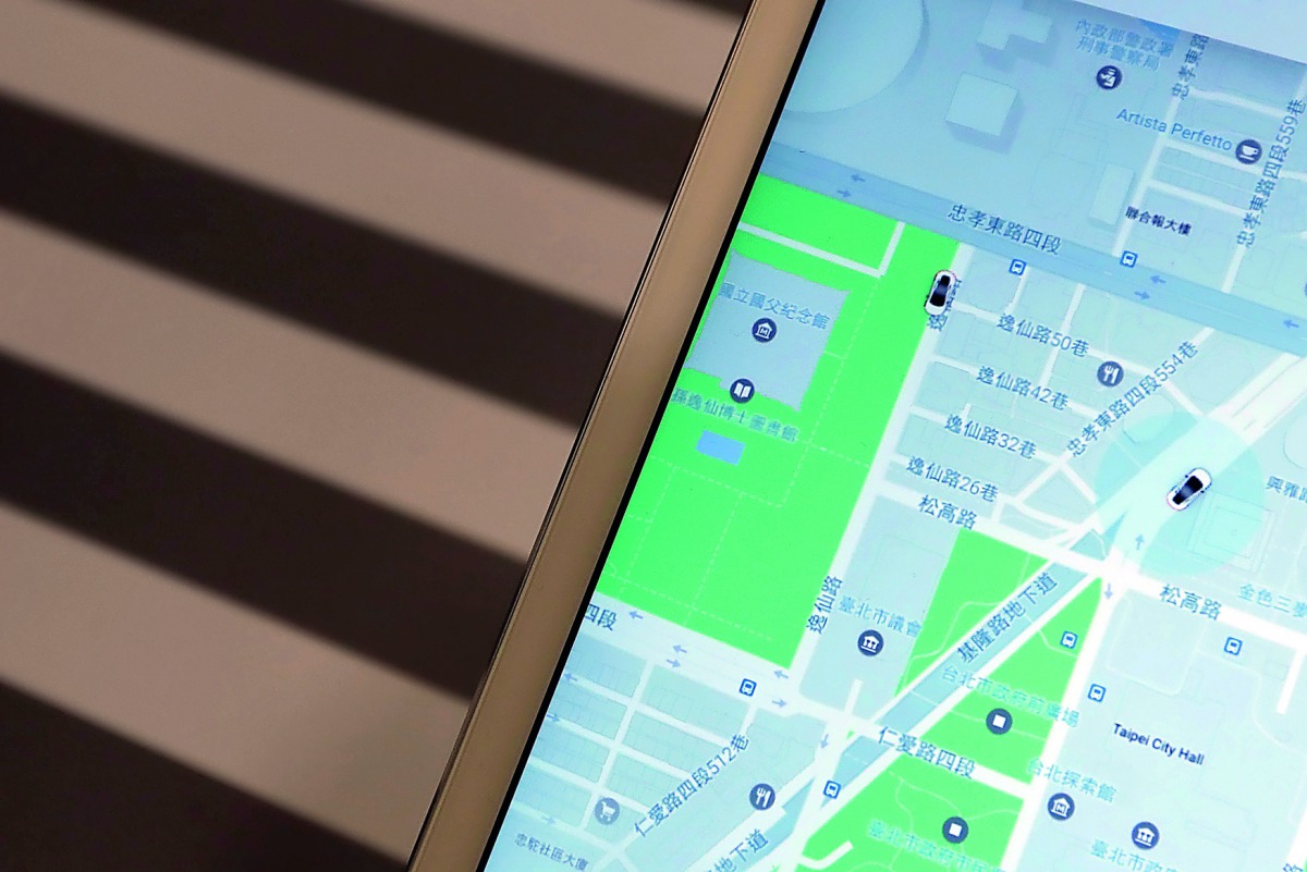 An iPad shows the app for Uber, during a news conference to announce Uber resumes ride-hailing service, in Taipei.
