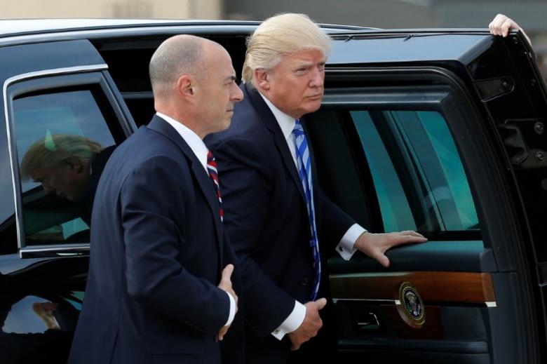 US President Donald Trump (R) arrives to board Air Force One at Joint Base Andrews outside Washington, US, before traveling to Palm Beach, Florida for the Good Friday holiday and Easter weekend, April 13, 2017. Reuters/Yuri Gripas