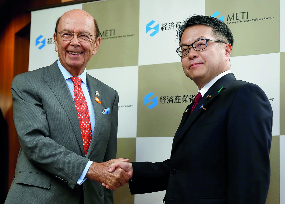 US Commerce Secretary Wilbur Ross is welcomed by Japan's Minister of Trade and Industry Hiroshige Seko at the start of their talks in Tokyo, Japan.