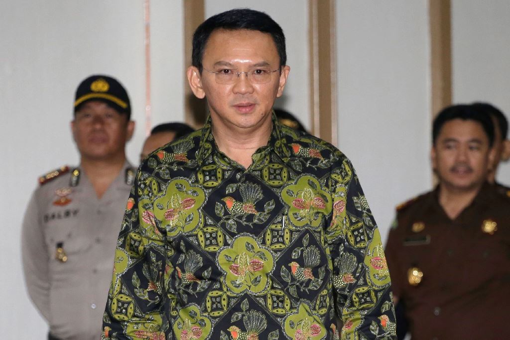 Jakarta's Governor Basuki Tjahaja Purname, also known as Ahok, arrives for his court hearing in Jakarta on April 20, 2017. AFP / POOL / Tatan Syuflana