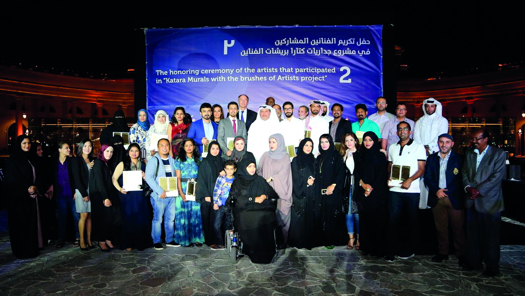 Artists and Katara officials at the honouring ceremony for second edition of ‘Katara Murals with the Brushes of Artists’ project, at Katara. 