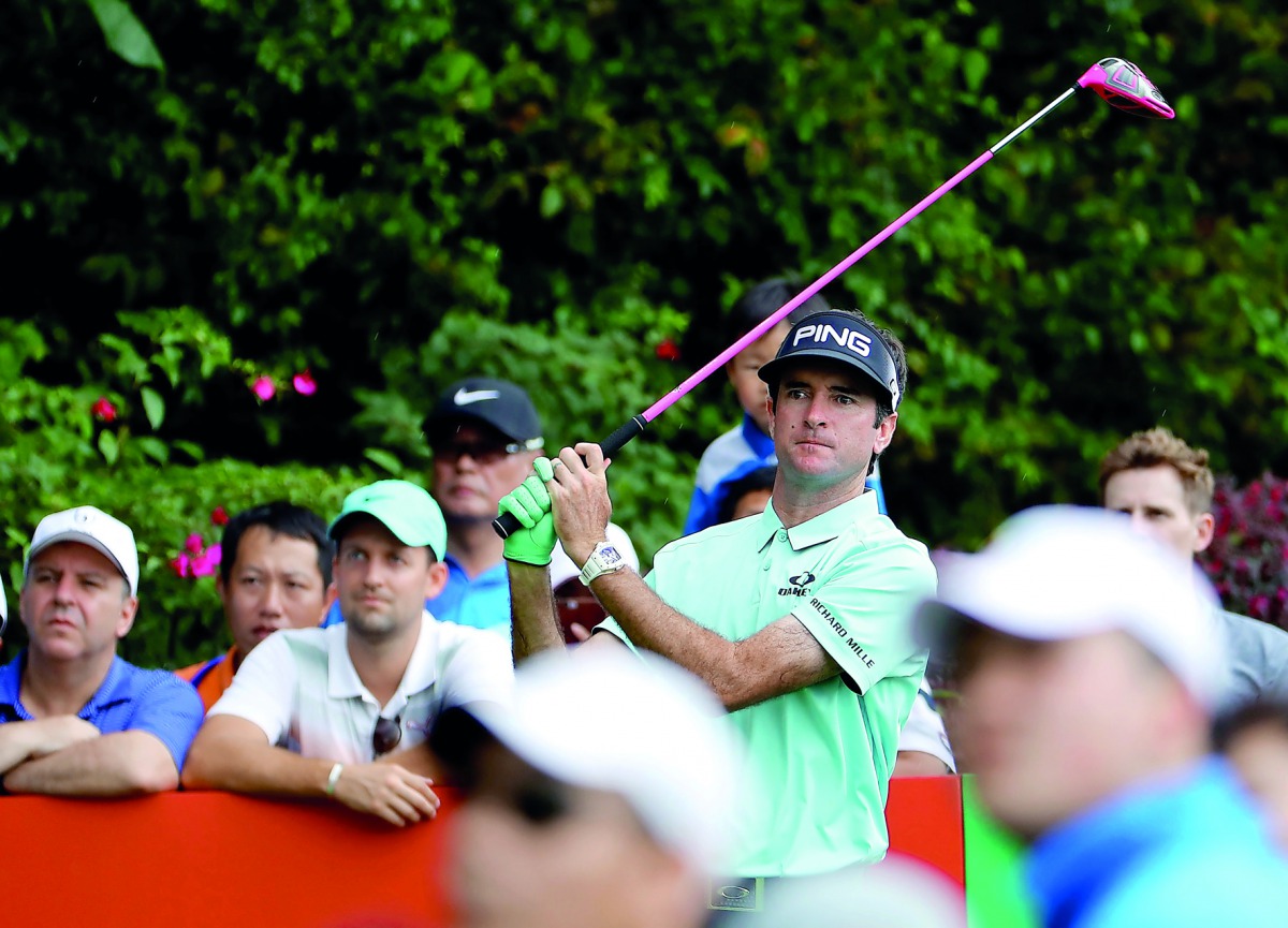 Bubba Watson of the US watches his shot during the Shenzhen International golf tournament in Shenzhen, in China's southern Guangdong Province, yesterday.