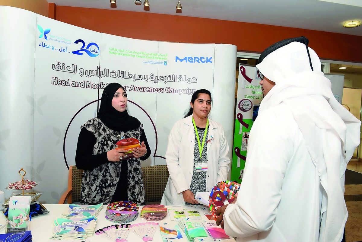 The HMC staff at a booth.