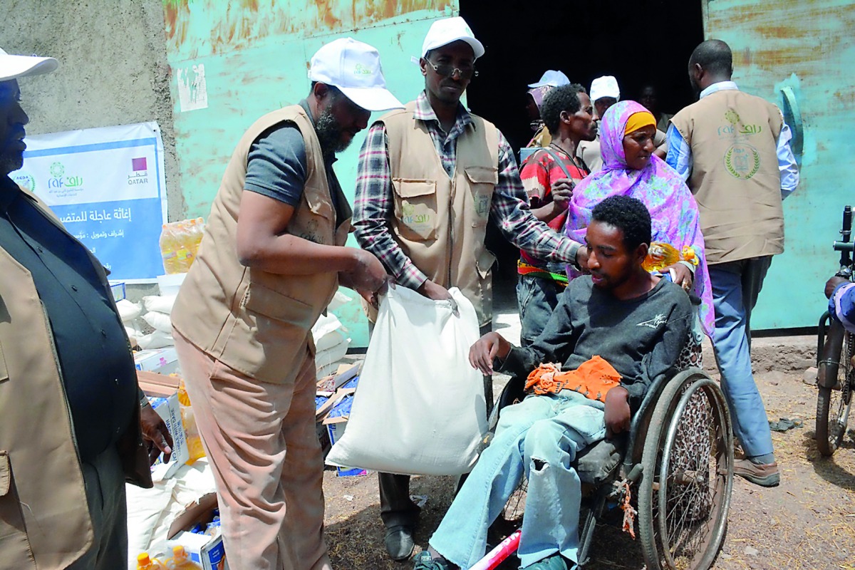 A man receiving food basket at a distribution centre set up by RAF in Ethiopia.