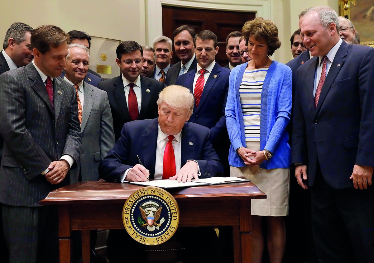 US President Donald Trump signing an executive order on Offshore Energy Strategy at the White House in Washington