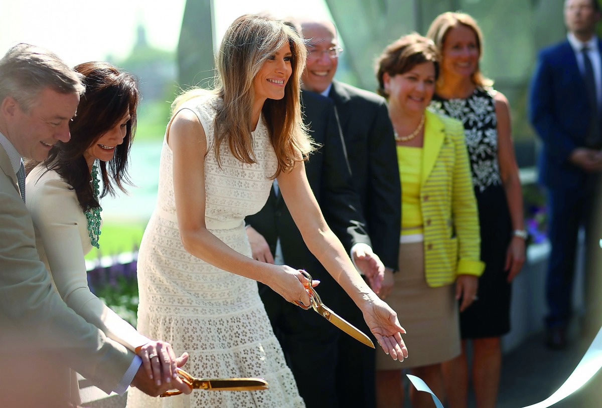 US First Lady Melania Trump takes part in a ribbon cutting ceremony at the Children's National Health System in Washington, DC, yesterday. Trump spoke at the opening of the Bunny Mellon Healing Garden for patients and famlies, an outdoor location to safel