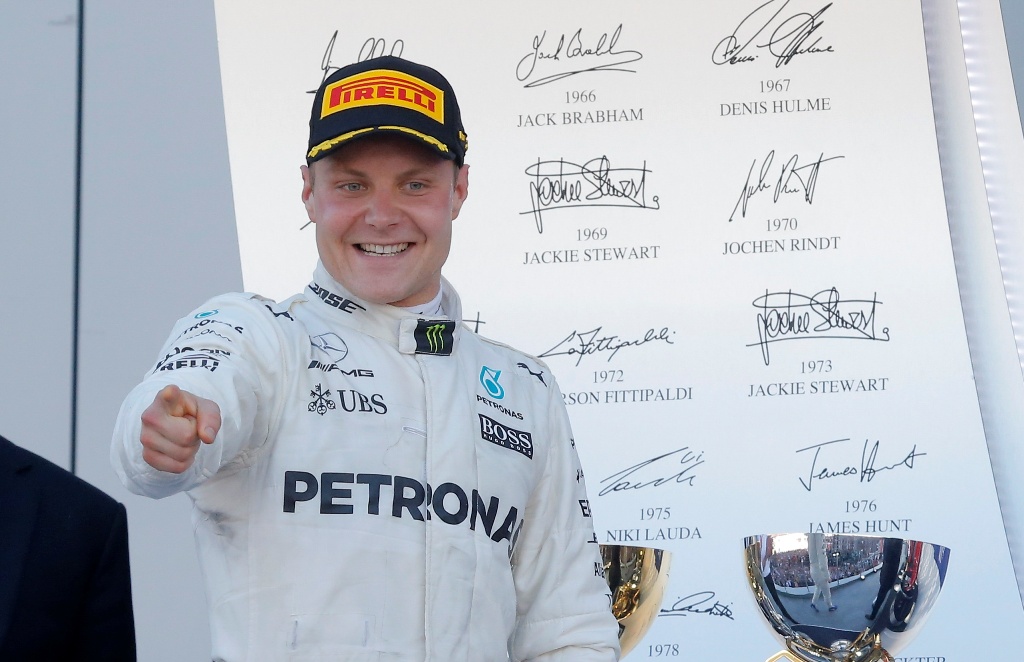Mercedes Formula One driver Valtteri Bottas of Finland celebrates the victory after the race. REUTERS/Maxim Shemetov