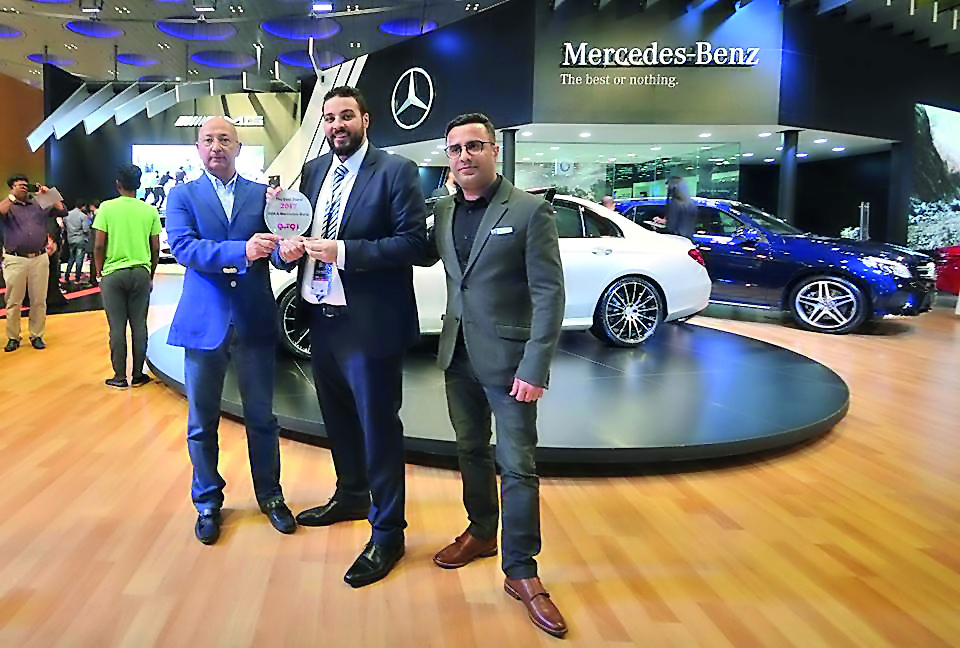 Nasser Bin Khaled Automobiles officials at the Qatar Motor Show 2017.