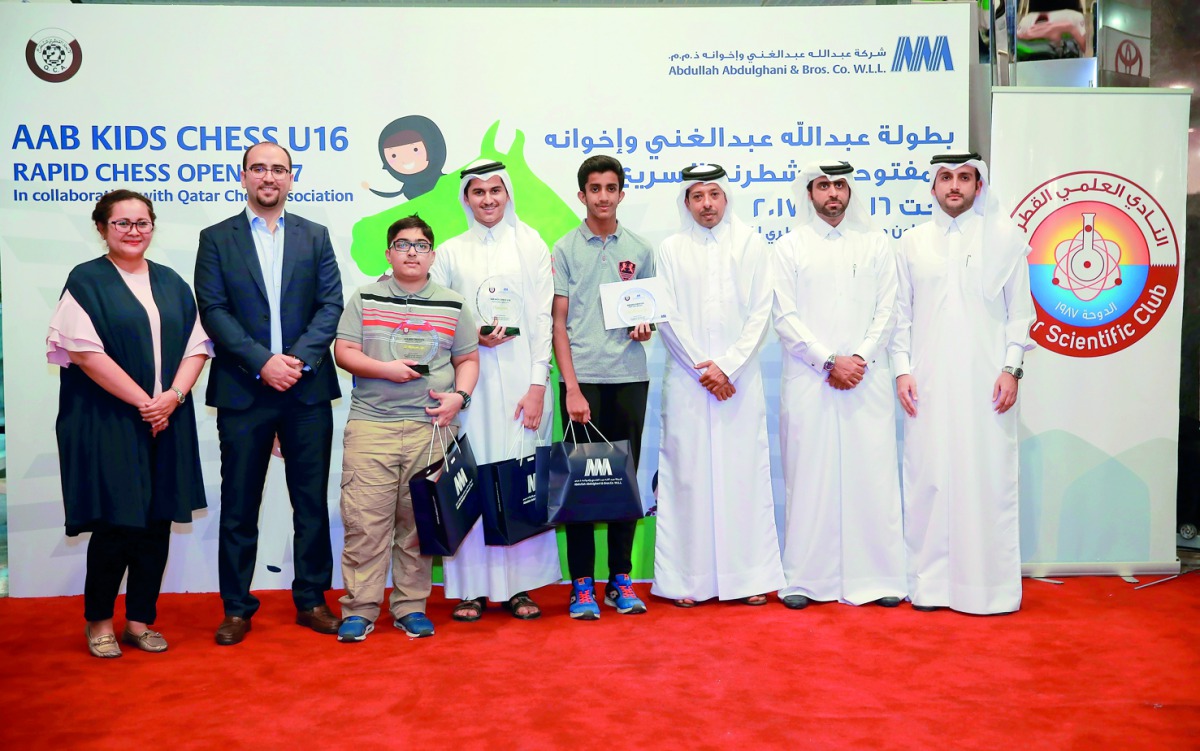 Winners of the AAB Kids  U16 Chess Tournament, pose with the guests.