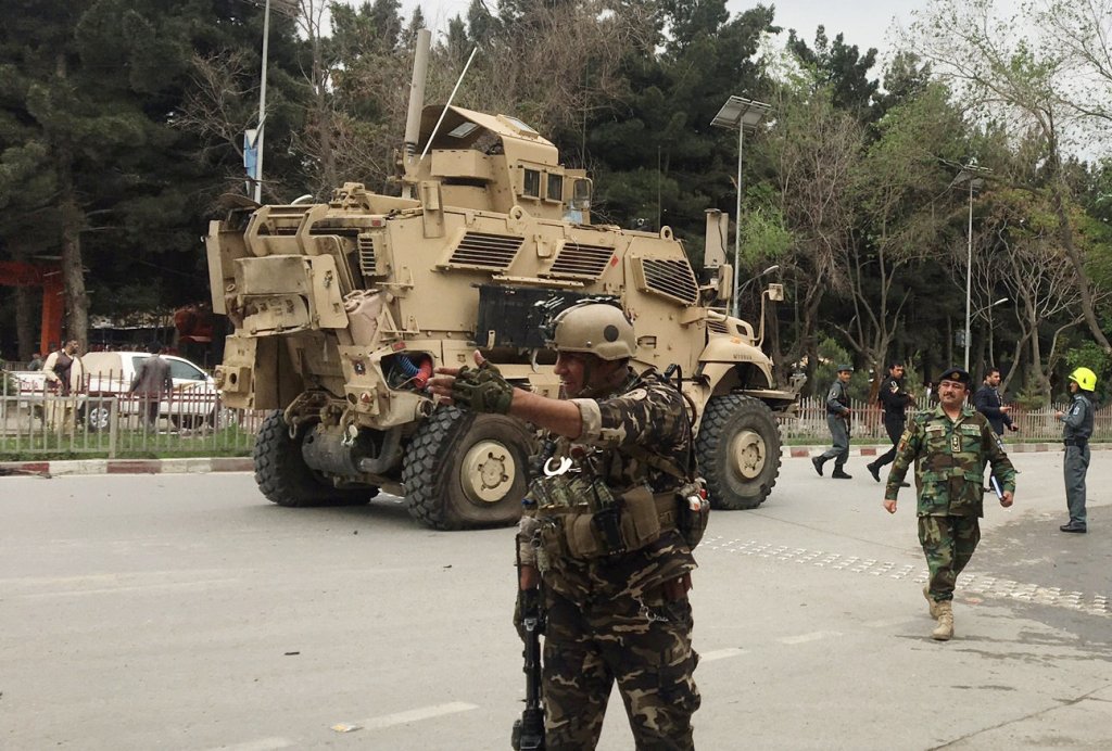 A damaged U.S. military vehicle is seen at the site of a suicide bomb attack in Kabul, Afghanistan May 3, 2017. REUTERS/Mirwais Harooni.