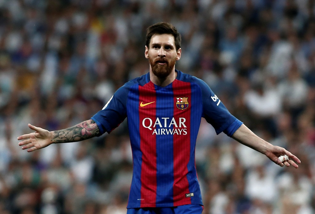 Lionel Messi of Barcelona gestures during the La Liga match between Real Madrid and Barcelona at Santiago Bernabeu Stadium in Madrid, Spain on April 23, 2017. Burak Akbulut - Anadolu Agency 