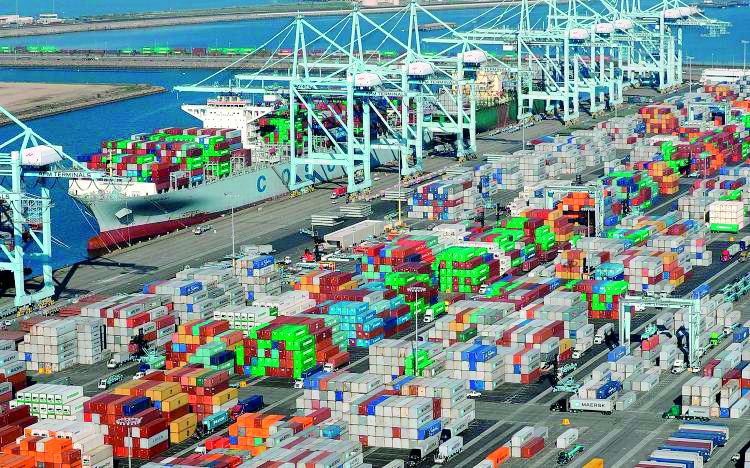 Shipping containers sit at the ports of Los Angeles and Long Beach, California.