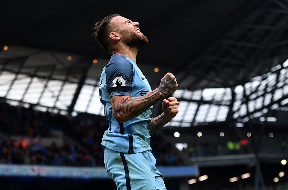 Manchester City's Argentinian defender Nicolas Otamendi celebrates scoring his team's fifth goal during the English Premier League football match between Manchester City and Crystal Palace at the Etihad Stadium in Manchester, north west England, on May 6,