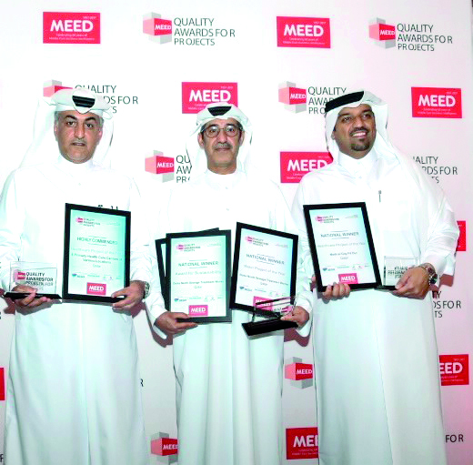 Mohammed Masoud Al Marri, Director of Infrastructure Affairs; Lahdan Al Muhannadi, Director of Buildings Affairs; Abdul Muhsin Hassan Al Rashid, Manager of Buildings Projects Department, after receiving Ashghal’s awards.