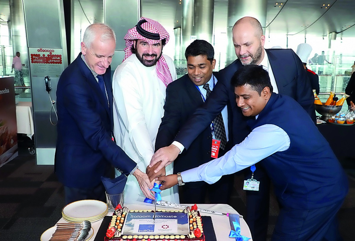 IndiGo and Hamad International Airport officials cut a cake at HIA to celebrate the arrival of the first flight by the Indian carrier to Doha