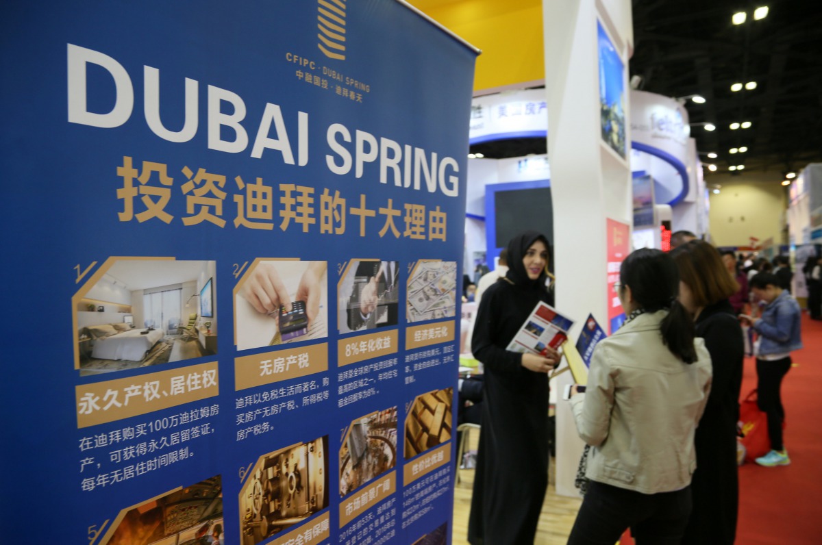 People visit an overseas property exposition in Beijing, April 13, 2017.  REUTERS/Stringer 