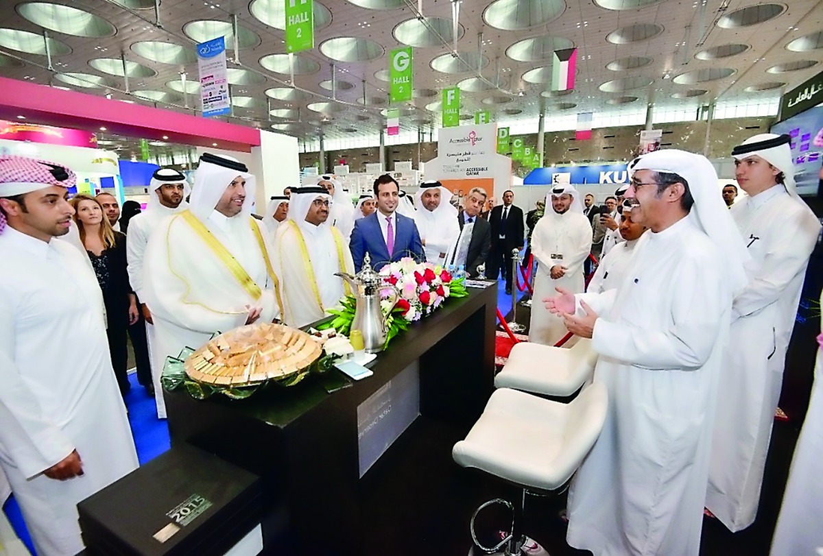 Minister of Commerce and Economy H E Sheikh Ahmed bin Jassim Al Thani and Minister of Energy and Industry H E Dr Mohammed bin Saleh Al Sada at the Ashghal booth in the presence of Eng Abdullah bin Hamad Al Attiyah, Assistant President of the Public Works 