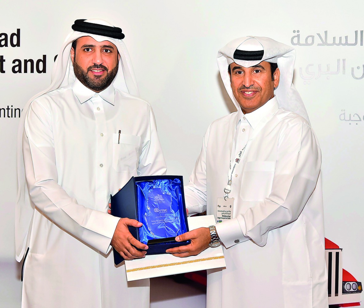 CENG Dean and QTTSC Director Dr Khalifa Al Khalifa (right) and Ministry of Transport and Communications Assistant Undersecretary for Land Transport Rashid Taleb Al Nabit.
