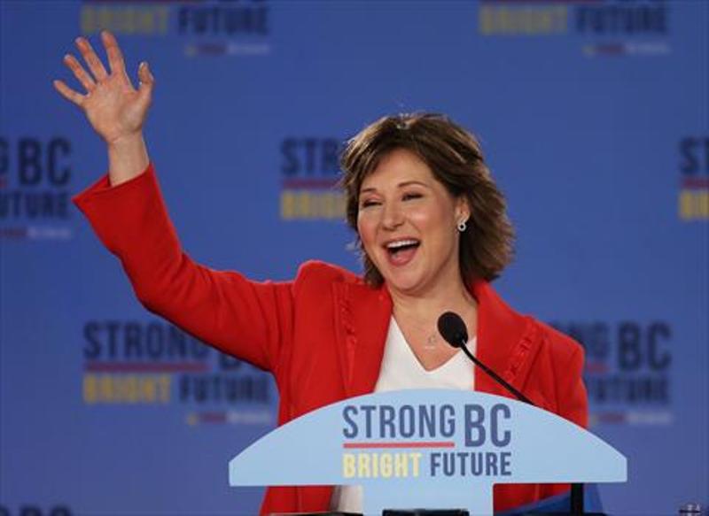 British Columbia Premier Christy Clark waves to supporters after delivering a speech at the B.C Liberal election party in Vancouver, British Columbia, Canada.