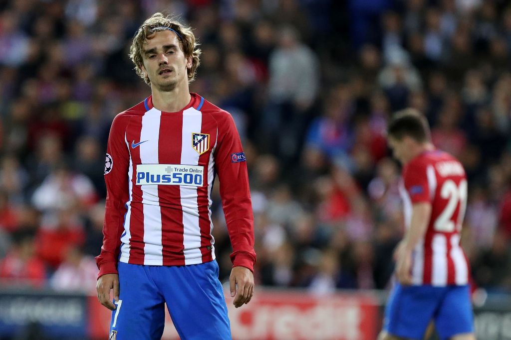 Atletico Madrid's French forward Antoine Griezmann stands on the field at the end of the UEFA Champions League semifinal second leg football match Club Atletico de Madrid vs Real Madrid CF at the Vicente Calderon stadium in Madrid, on May 10, 2017. / AFP 
