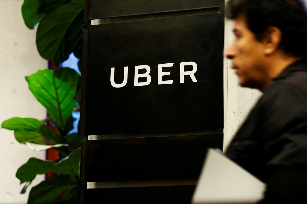 FILE PHOTO: A man exits the Uber offices in Queens, New York, U.S., February 2, 2017. REUTERS/Brendan McDermid/File Photo
