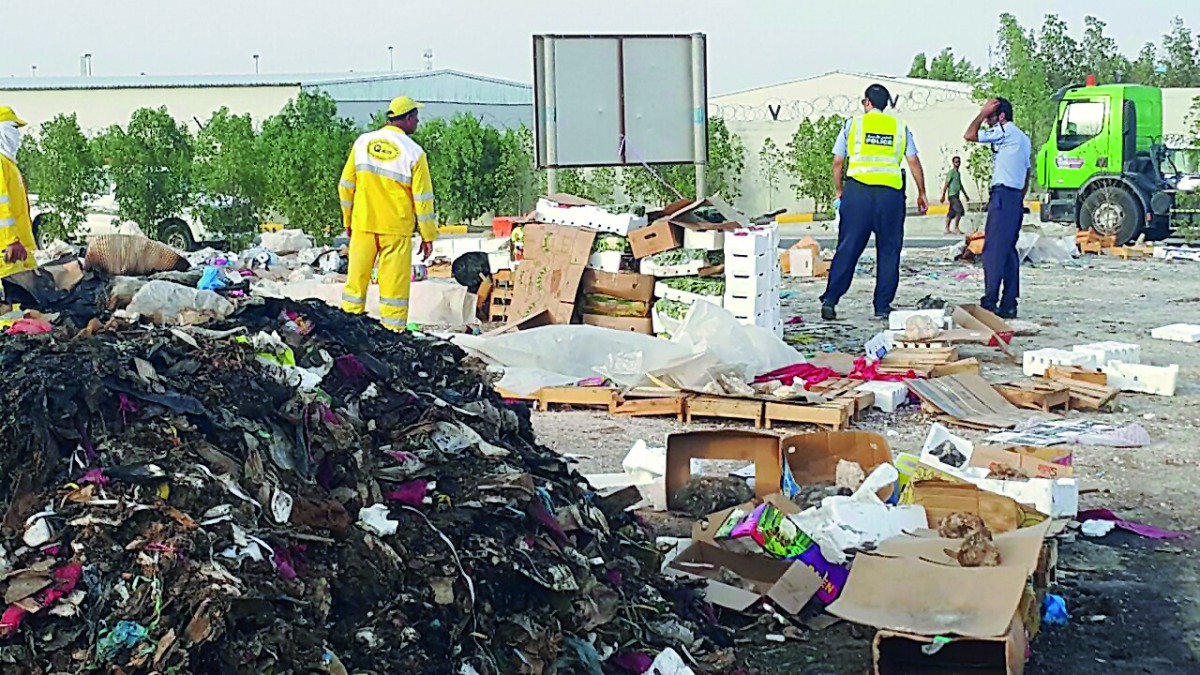 Authorities during a raid at an unauthorised market in Al Shahaniya Municipality.