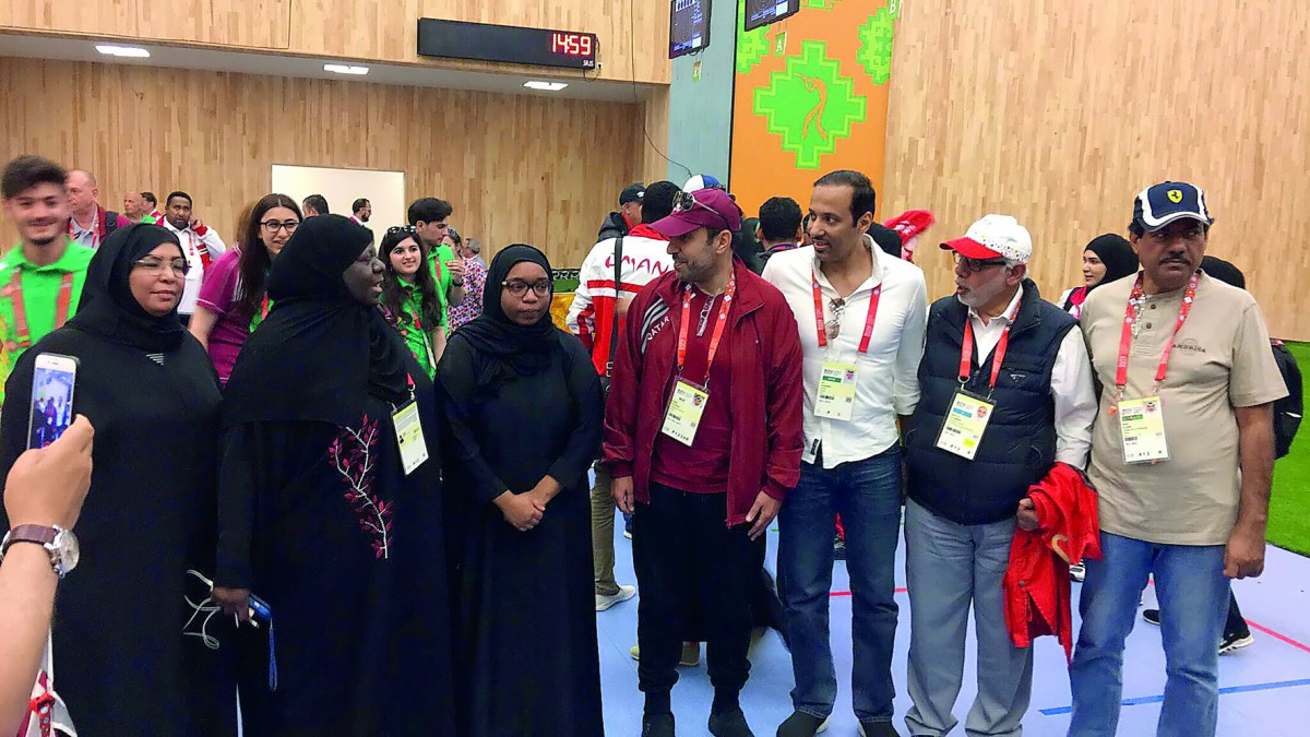 Qatar's Dana Saad Al Mubarak (third left) winner of the gold medal at the women’s 25m pistol final at the Islamic Solidarity Games in Baku is seen with Dr Thani Abdulrahman Al Kuwari, General Secretary of Qatar Olympic Committee and  other officials of Qa