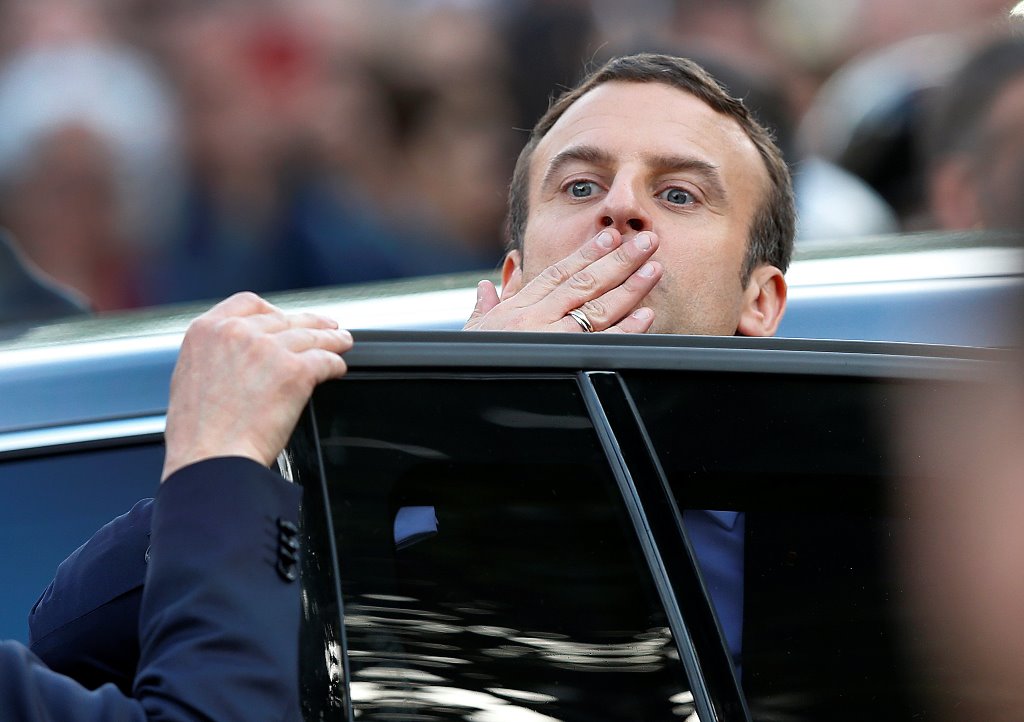 French President Emmanuel Macron reacts as he leaves the Hotel de Ville in Paris, France, May 14, 2017. REUTERS/Francois Lenoir
