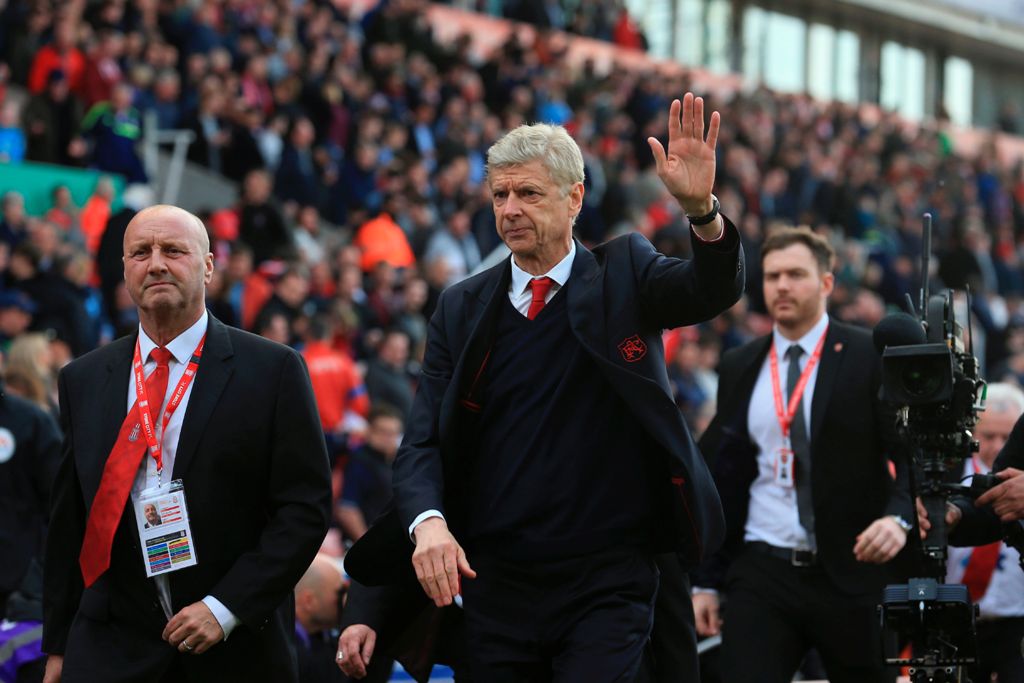 Arsenal's French manager Arsene Wenger (C) gestures as he leaves after the English Premier League football match between Stoke City and Arsenal at the Bet365 Stadium in Stoke-on-Trent, central England on May 13, 2017. Arsenal won the game 4-1. AFP / Linds