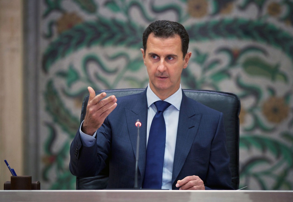 A handout picture released by the official Syrian Arab News Agency on July 11 2016 shows Syrian President Bashar al-Assad during a meeting with members of his government in Damascus 