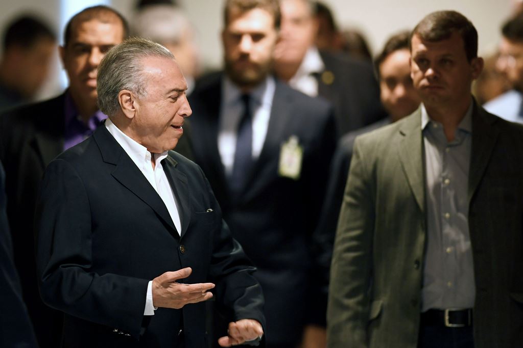 Brazilian President Michel Temer arrives to make a statement at Planalto Palace in Brasilia, Brazil, on May 20, 2017. AFP / EVARISTO SA
