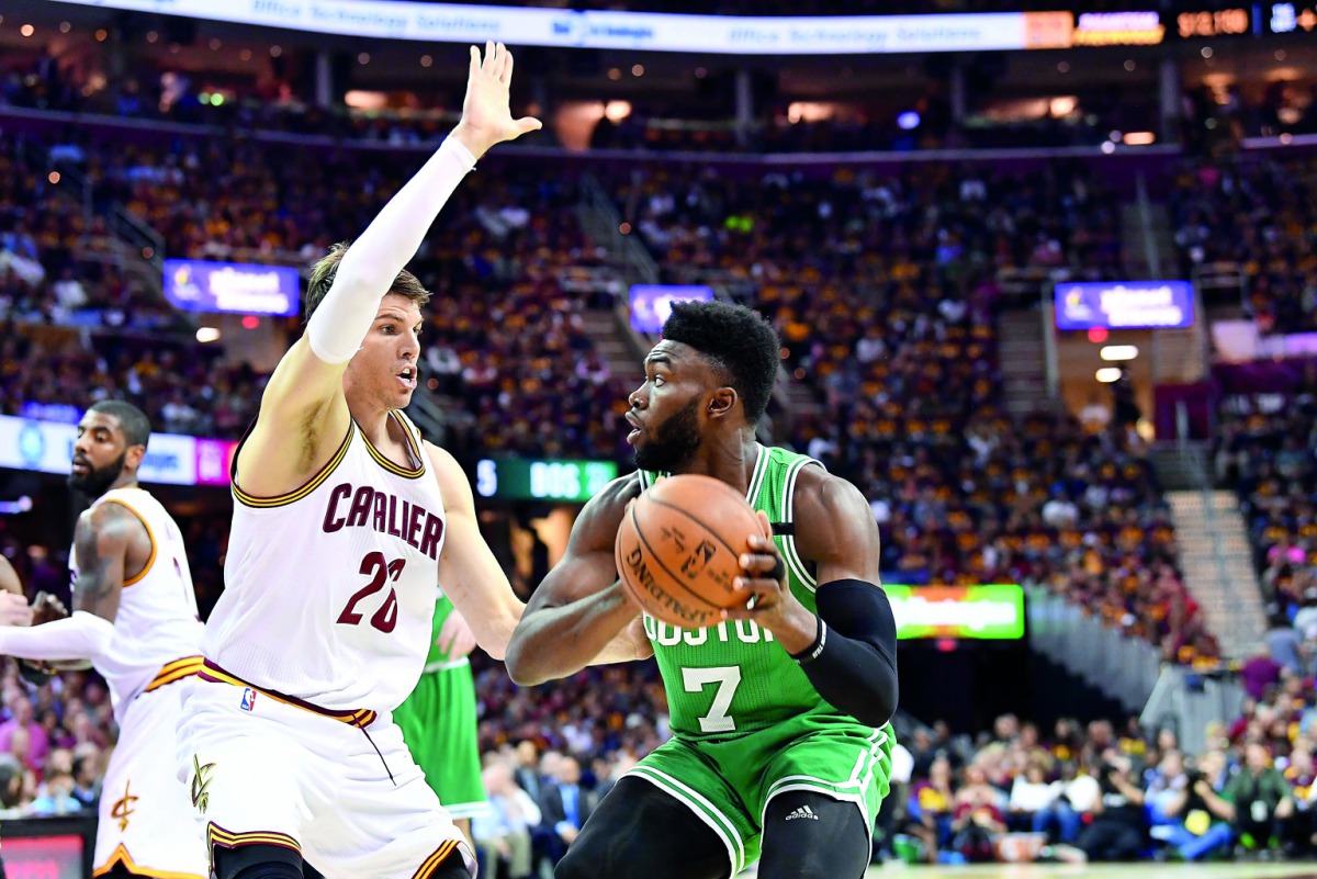 Jaylen Brown (70 of the Boston Celtics drives against Kyle Korver (26) of the Cleveland Cavaliers during Game Three of their 2017 NBA Eastern Conference Finals at Quicken Loans Arena in Cleveland, Ohio