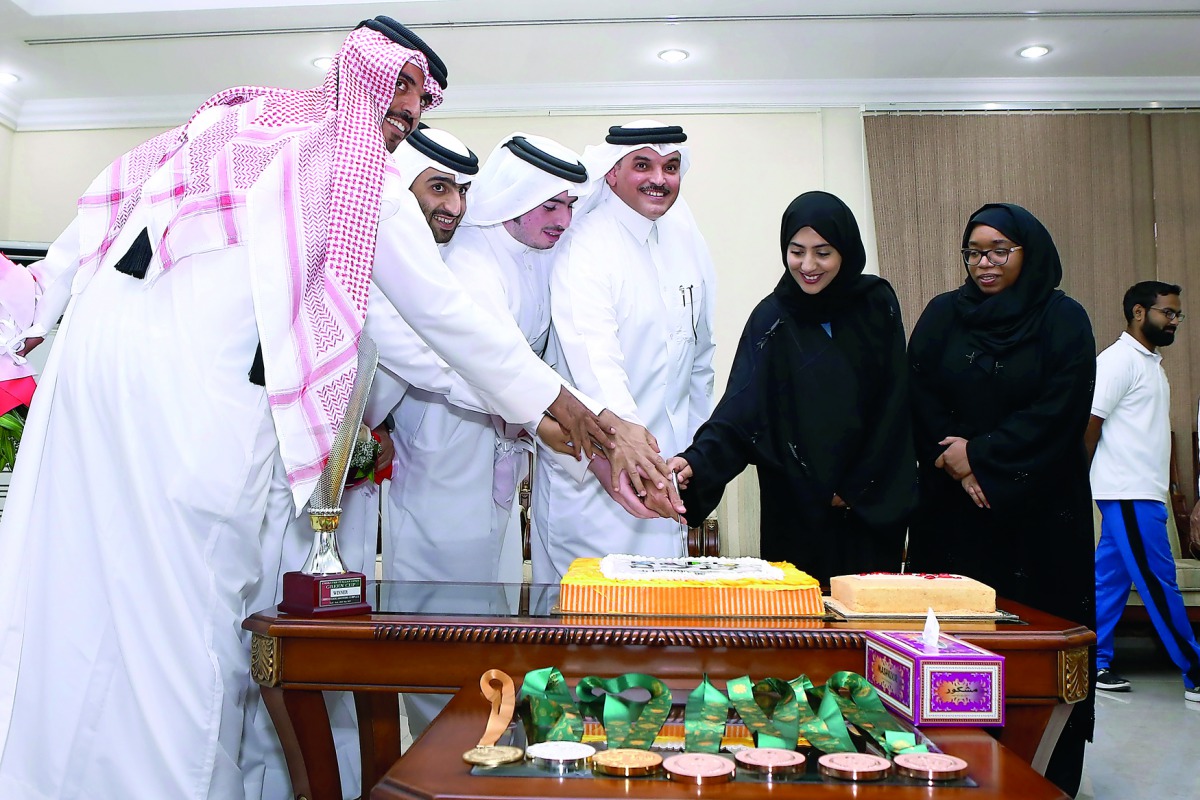 Qatar Shooting and Archery Association (QSAA) President Ali Mohammed Al Kuwari cutting a cake along with Qatari shooters who won medals at the Islamic Solidarity Games held in Baku,  Azerbaijan.  QSAA yesterday honoured the shooters who bagged medals in B