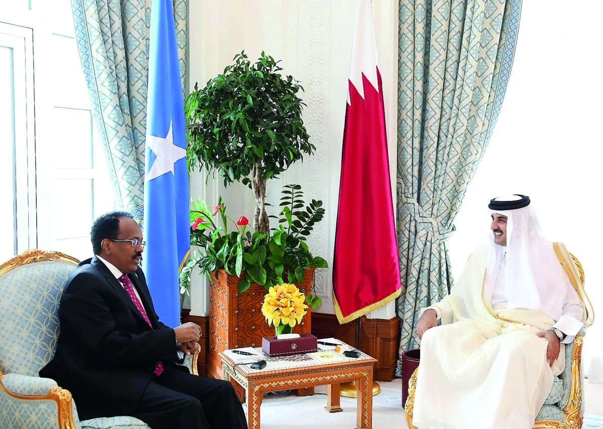 Emir H H Sheikh Tamim bin Hamad Al Thani with the President of the Republic of Somalia, Mohamed Abdullahi Mohamed Farmajo, at the Emiri Diwan yesterday. They discussed the means of enhancing bilateral cooperation and prospects of promoting it in various f