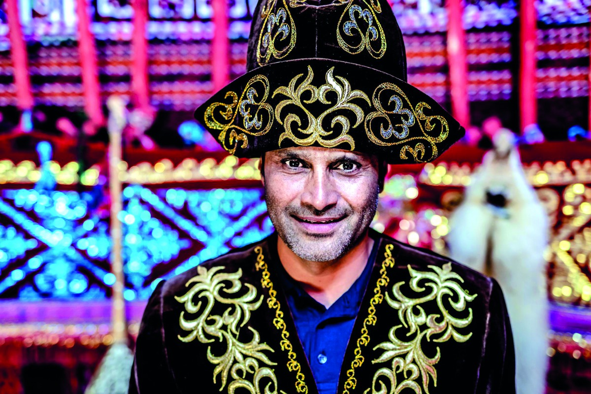 Al Attiyah dressed in traditional Kazakh costume.