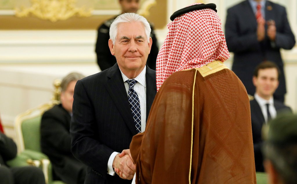 FILE PHOTO: US Secretary of State Rex Tillerson (C) shakes hands with a participant at the Royal Court in Riyadh, Saudi Arabia May 20, 2017. REUTERS/Jonathan Ernst/Files