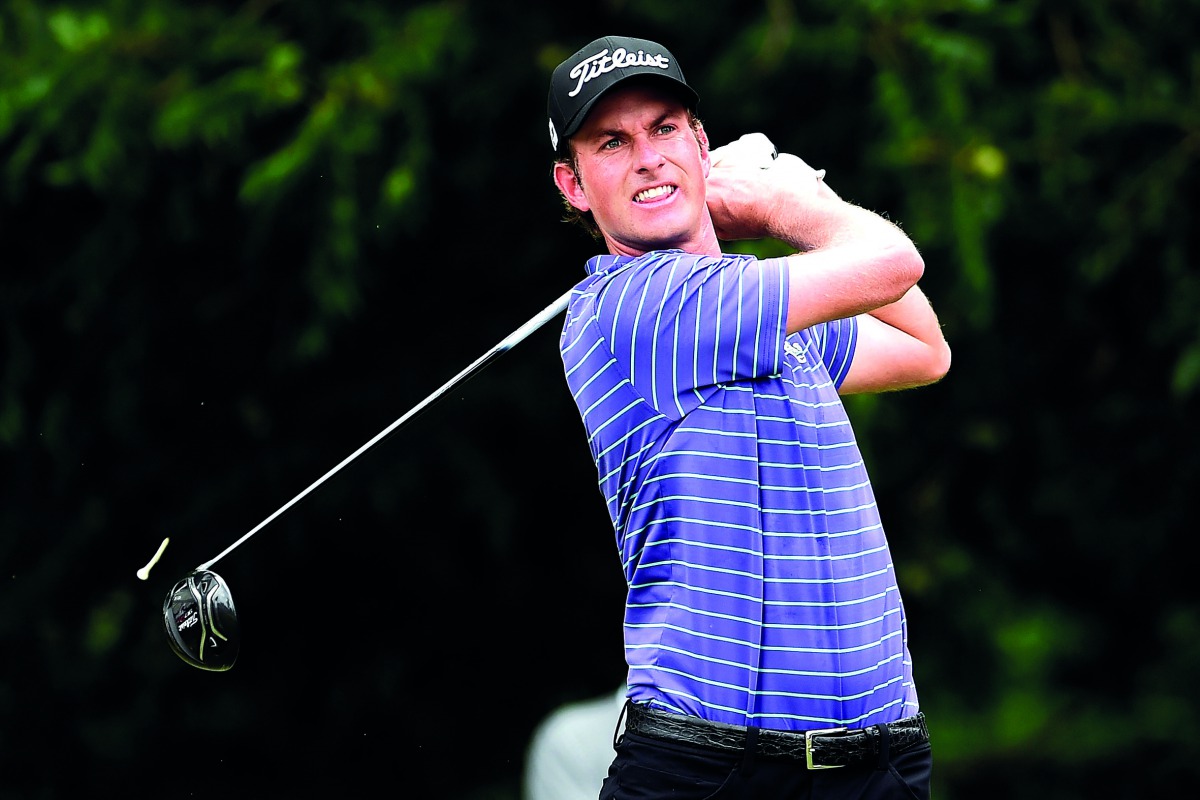 Webb Simpson plays his shot during Round Three of the Dean & Deluca Invitational at Colonial Country Club in Fort Worth, Texas on Saturday.
