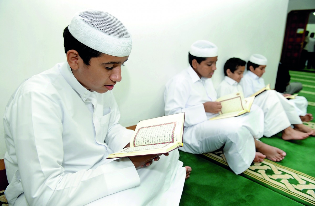 A group of boys reciting the Holy Quran at the Aisha Abdullah Abdul Ghani Masjid in the Old Airport area of Doha yesterday. Pic: Salim Matramkot/ The Peninsula
