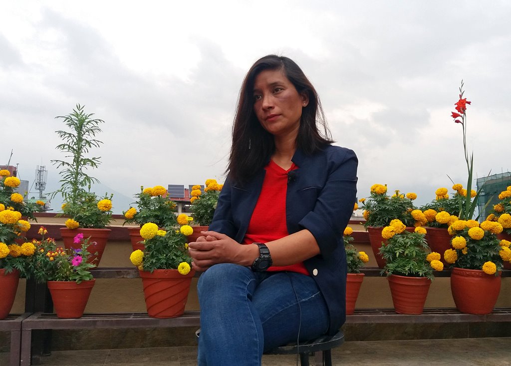Indian mountain climber Anshu Jamsenpa, who climbed Everest twice in five days, attends her interview at a hotel in Kathmandu, Nepal May 27, 2017. Picture taken May 27, 2017. REUTERS/Yubaraj Sharma Chapagain
