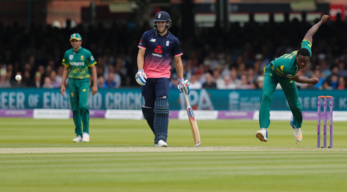 South Africa's Kagiso Rabada (R) bowls the ball during the third One-Day International (ODI) cricket match between England and South Africa at Lord's Cricket Ground in London on May 29, 2017. (AFP / Adrian DENNIS)
