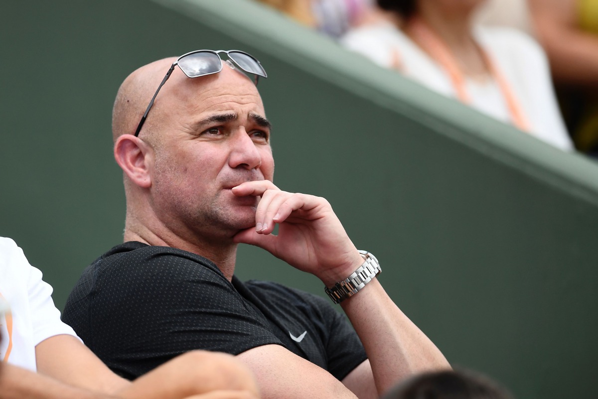 US coach Andre Agassi watches Serbia's Novak Djokovic playing against Spain's Marcel Granollers during their tennis match at the Roland Garros 2017 French Open on May 29, 2017 in Paris. (AFP / GABRIEL BOUYS)