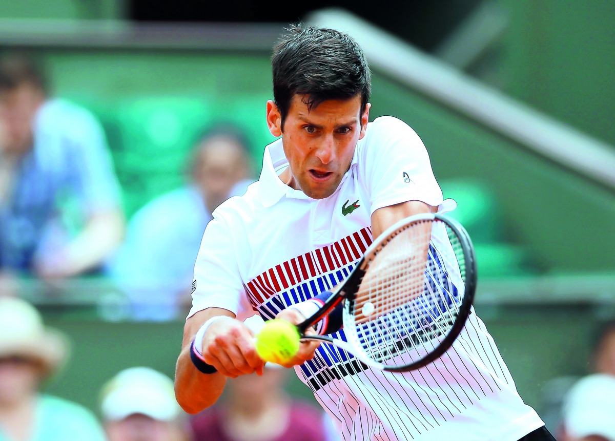 Serbia's Novak Djokovic in action during his first round match against Spain's Marcel Granollers yesterday.
