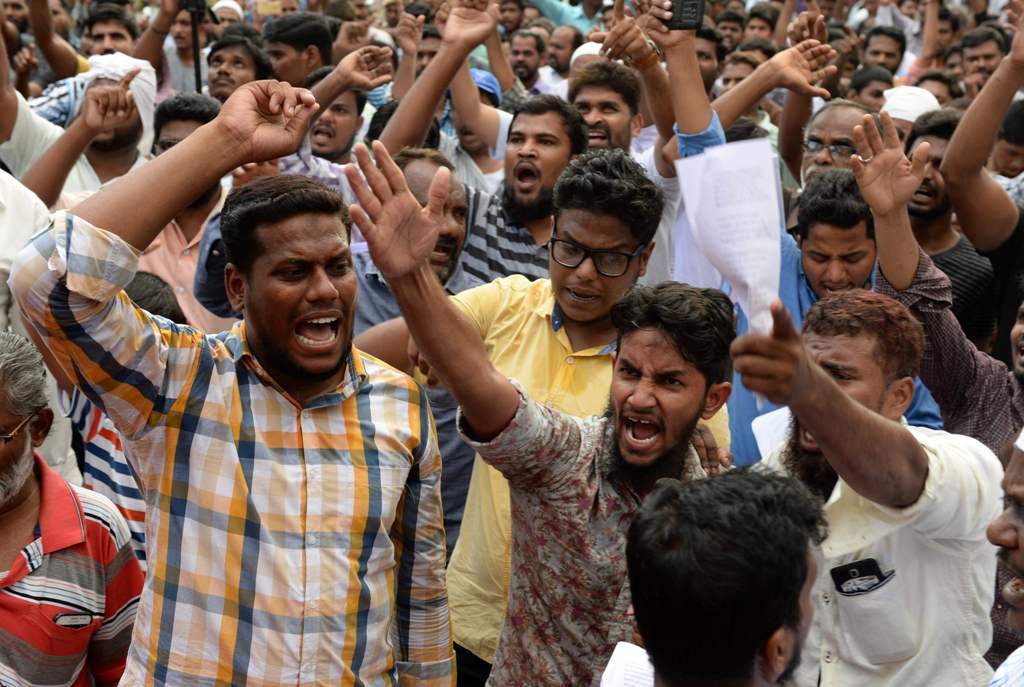 Indian Muslim protesters shout slogan against Prime Minister Narender Modi and the Indian government during a portest against a ban on the sale of animals for slaughter in Chennai on May 29, 2017.   AFP / ARUN SANKAR