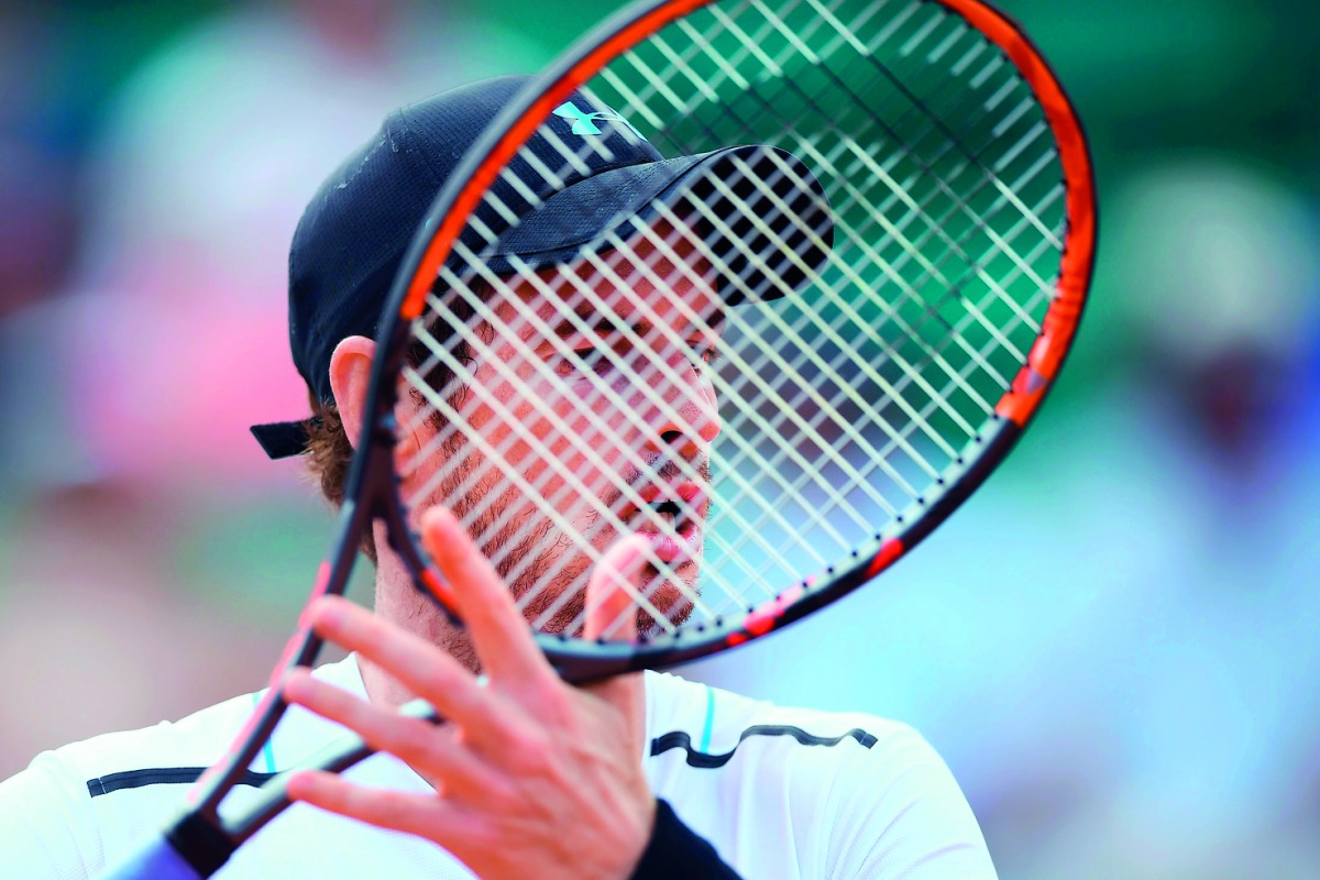 Britain's Andy Murray looks on  during his match  against Slovakia's Martin Klizan at the Roland Garros 2017 French Open in Paris yesterday. World number one Murray reached the third round with a bruising 6-7 (3/7), 6-2, 6-2, 7-6 (7/3) win over Klizan.