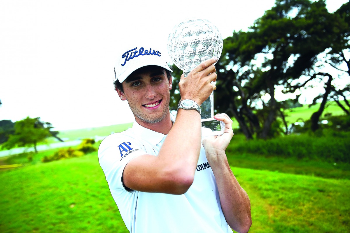 Italy's Renato Paratore poses for photographers with the trophy after winning the Golf Masters 2017 at Barseback Golf Club, yesterday.