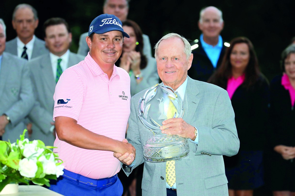 Jack Nicklaus (right) poses with Jason Dufner on the 18th hole after the final round of the Memorial Tournament at Muirfield Village Golf Club in Dublin, Ohio, on Sunday.