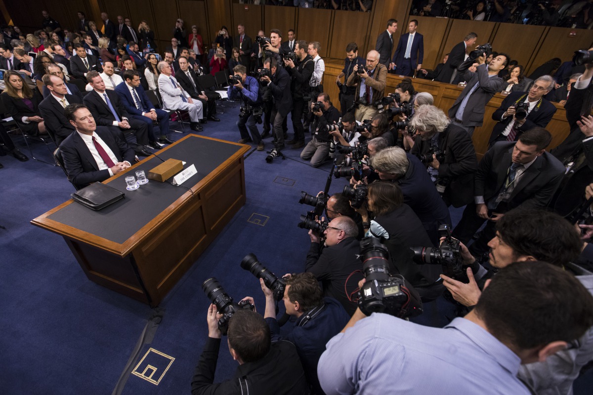 Former FBI Director James Comey (L) testifies during a US Senate Select Committee on Intelligence hearing on Capitol Hill in Washington, United States on June 08, 2017. (Samuel Corum - Anadolu Agency)