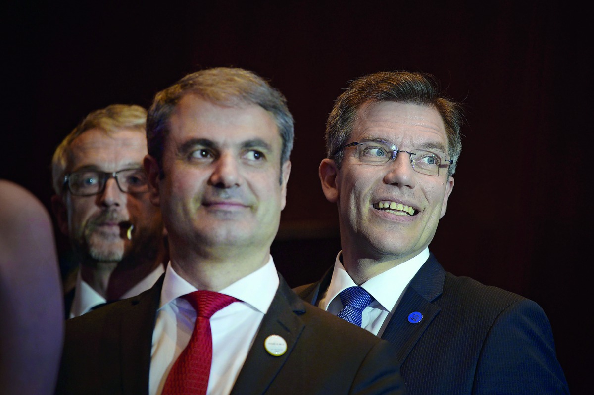 Riku Huttunen (right), Director-General of Finland's Energy Department of the Ministry of Employment and the Economy, attends the Clean Energy Ministerial international forum that concluded in Beijing, yesterday. Officials and business leaders from around