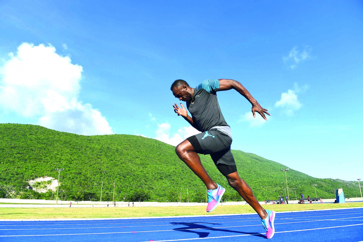 Usain Bolt of Jamaica trains at the University of West Indies in Kingston on Thursday.
